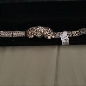 A beautiful 925 SS bracelet made in Thailand with a floral design.